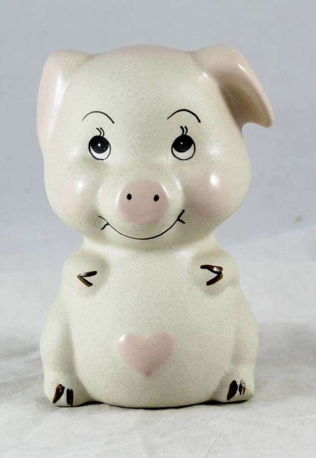 Beige pig with pink heart