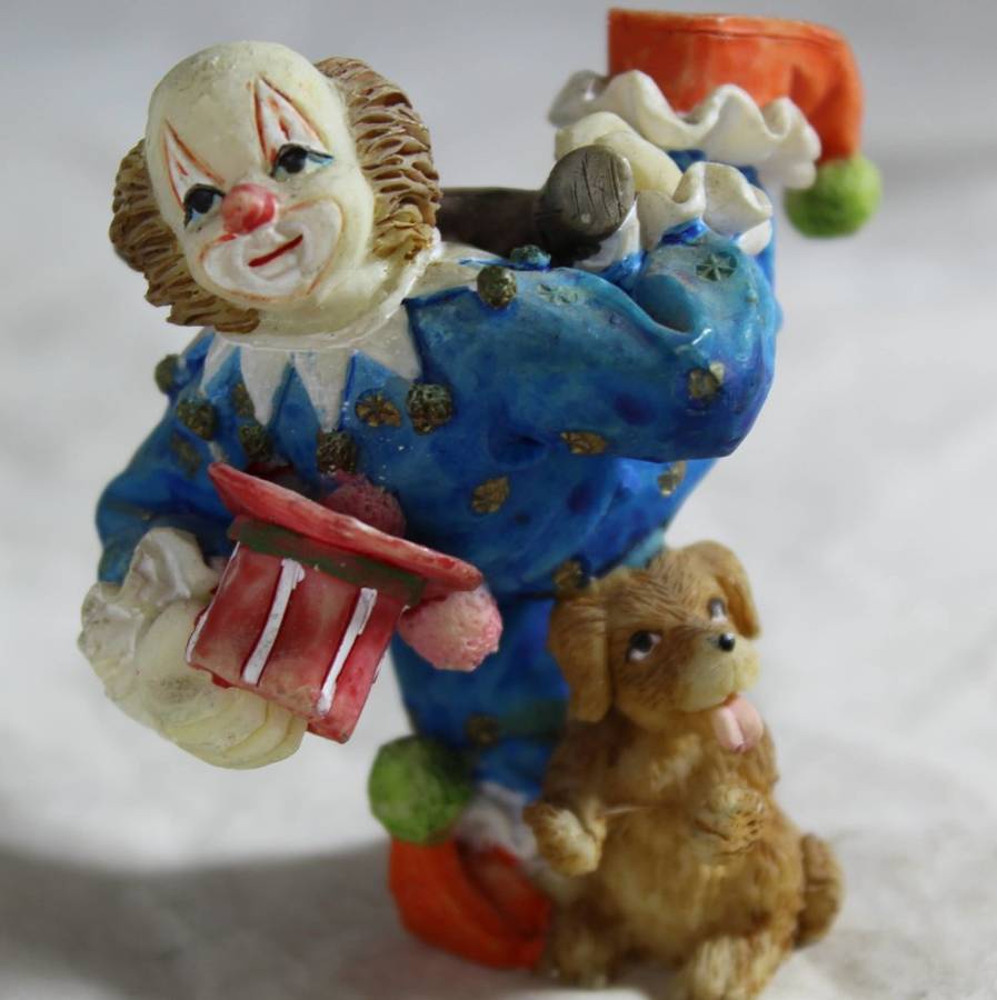 Dancing clown with dog