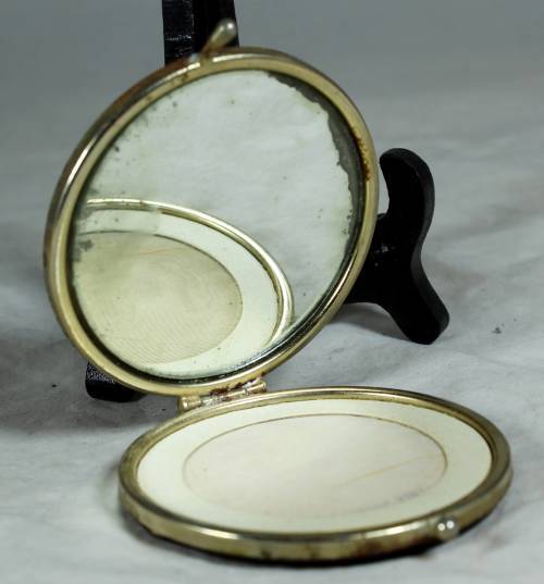 Powder compact - hide covered