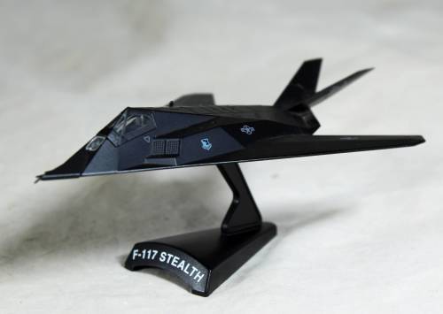 Postage Stamp Planes - Metal Die Cast on Stand -  F-117  Stealth  - Bid Now!!