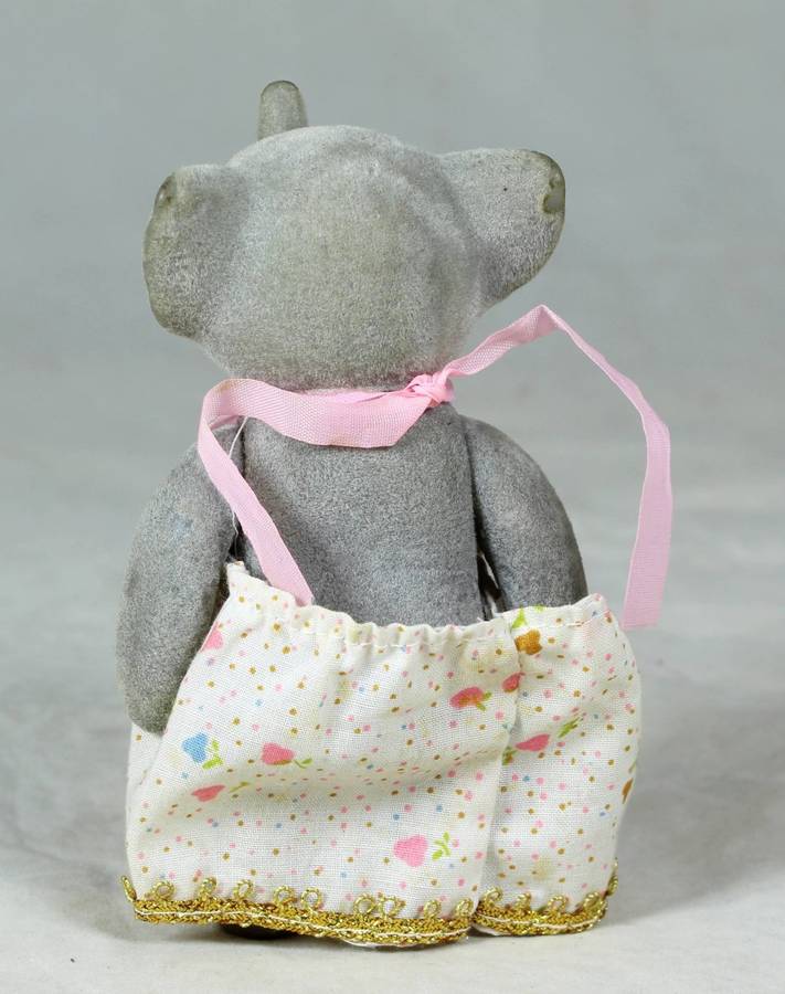 Small furry mother elephant