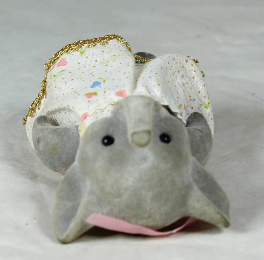 Small furry mother elephant