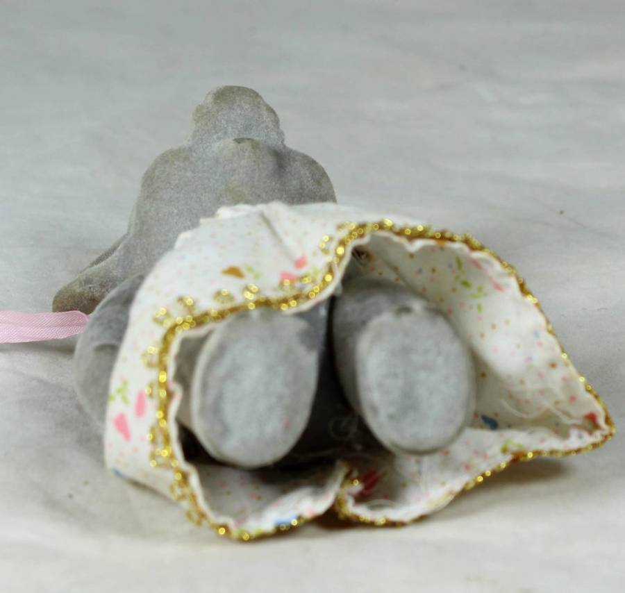 Small furry mother elephant