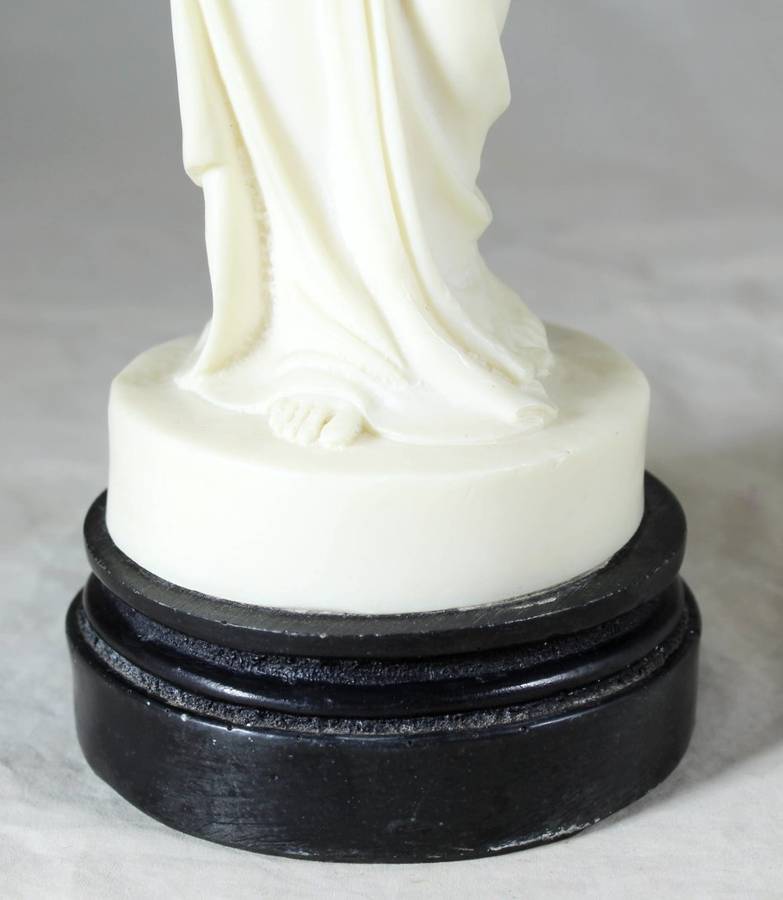Detailed molded lady sculpture