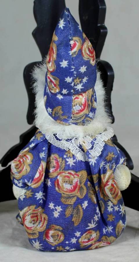 clown in a onesie and a hat