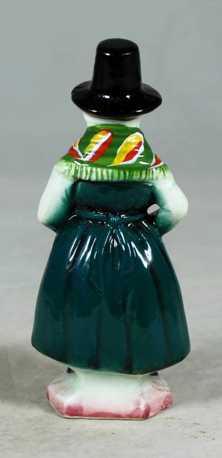 Vintage porcelain figurine - woman dressed in traditional clothes #53