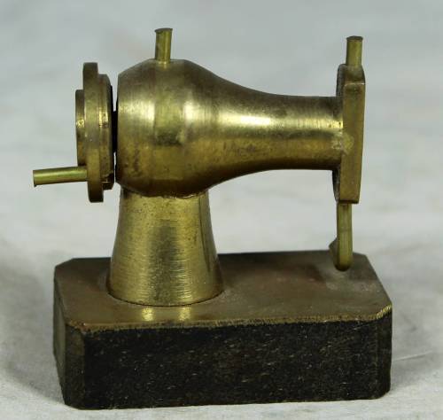 Miniature brass sewing machine