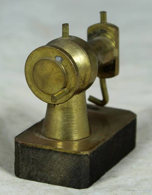 Miniature brass sewing machine