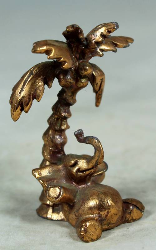 MINIATURE-BRASS COLOR LEAD ELEPHANT UNDER A PALM TREE-BID NOW!!