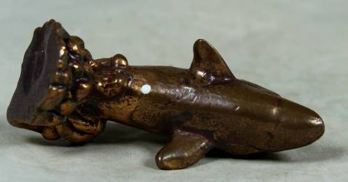 Miniature brass color lead dolphin