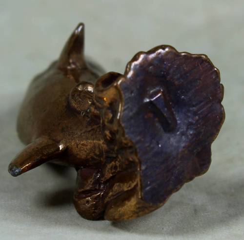 Miniature brass color lead dolphin