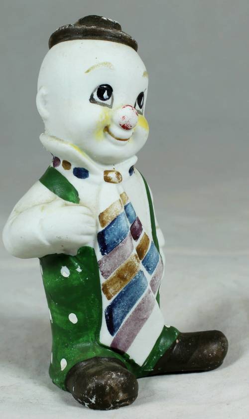 Smiling clown with a large tie