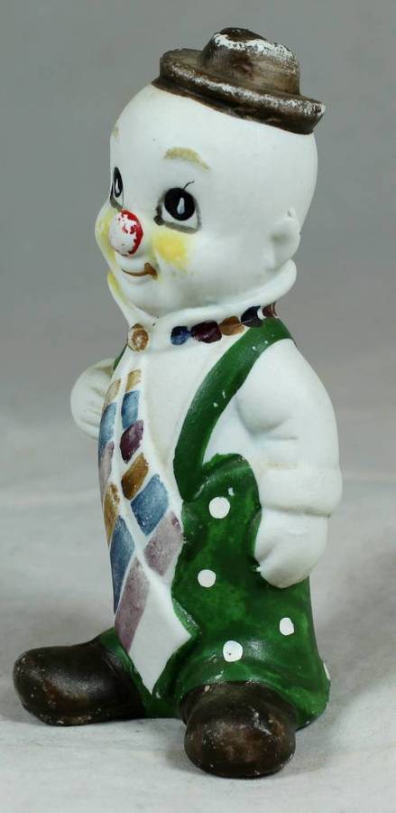 Smiling clown with a large tie