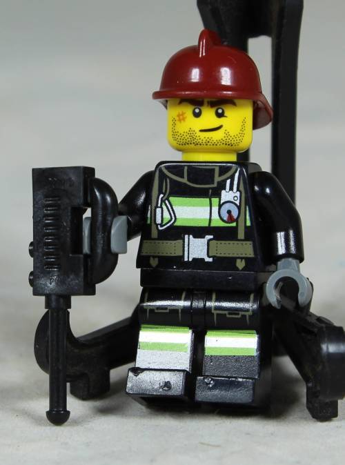 Lego mini figurine - Fireman with a scar and jackhammer (CTY0343)