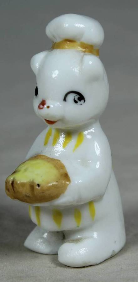 Miniature chef kitty with bread