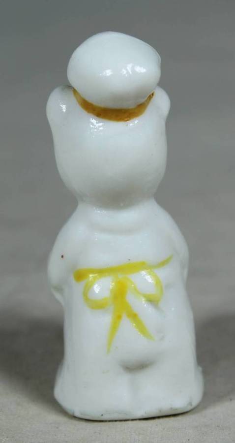 Miniature chef kitty with bread