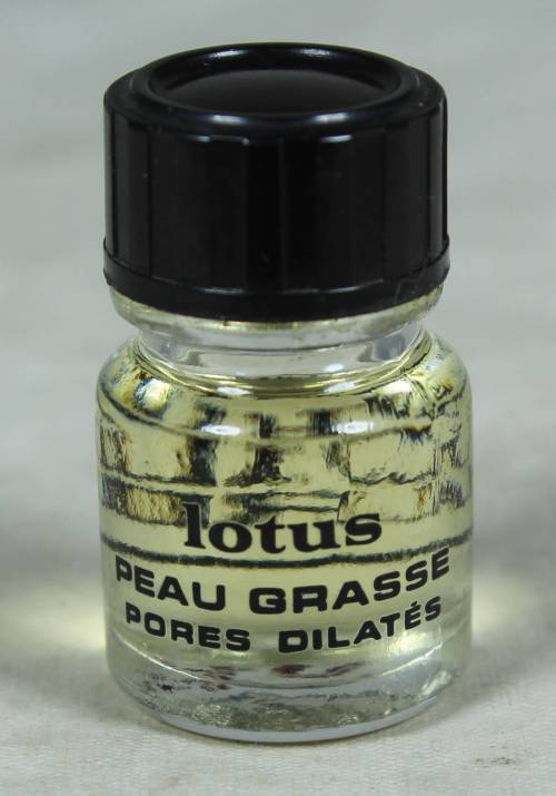 FULL MINIATURE BOTTLE OF HUILE CLARINS LOTUS PEAU GRASSE PERFUME (BEAUTIFUL) BID NOW!!