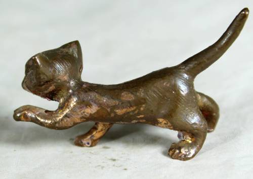 Miniature brass feral cat
