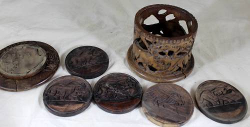 Set of six wooden coasters in container