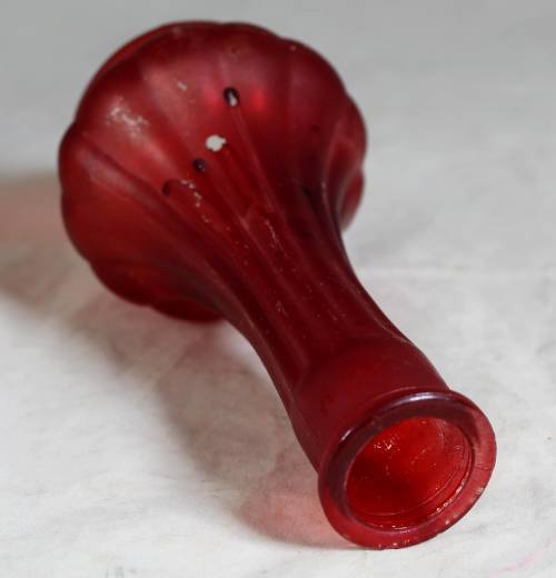 Small red ornate vase