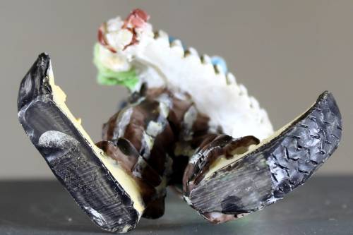 Small clown figurine - playing a concertina