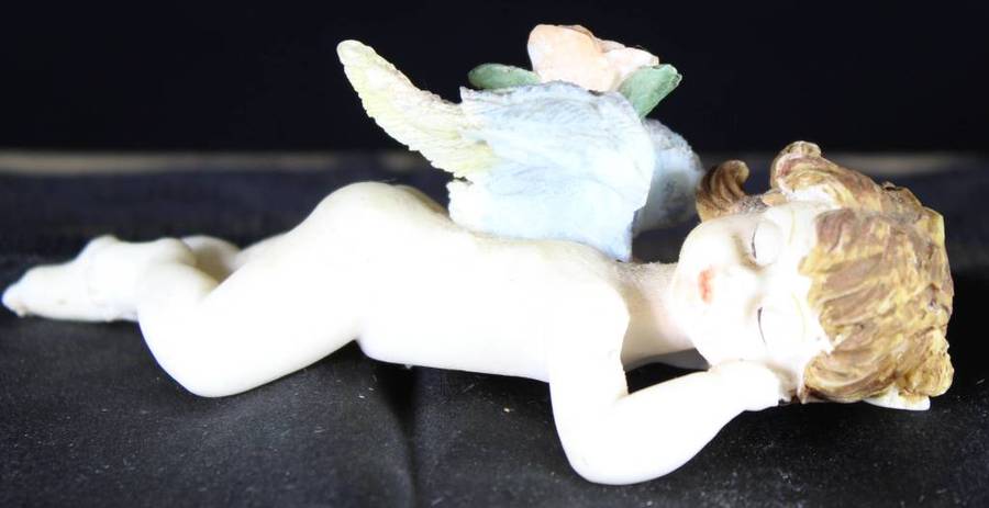 Angel child sleeping - naked