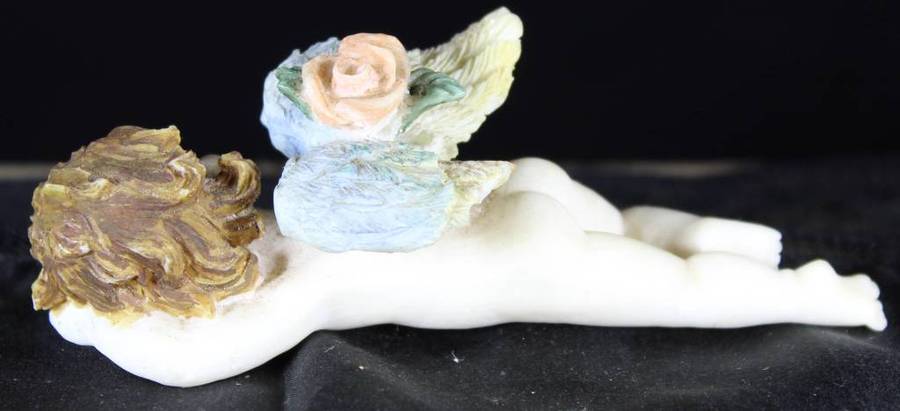 Angel child sleeping - naked