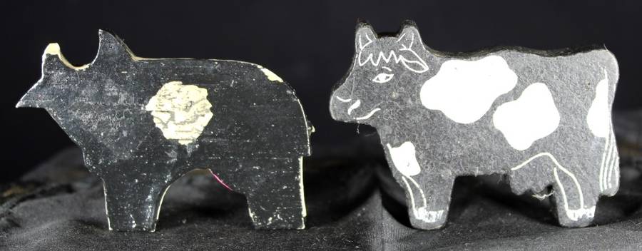 Pair of small wooden cows