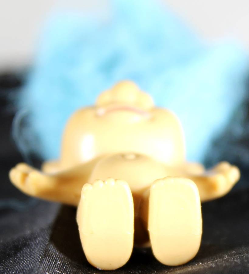 Miniature troll with powder blue hair