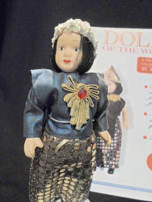 DOLLS of the World - Indonesia - Genuine Porcelain Doll - Complete with stand and guide book!!