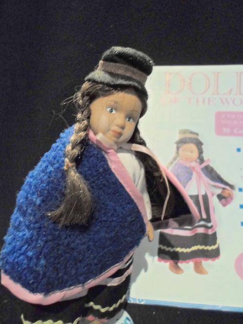 DOLLS of the World - Colombia - Genuine Porcelain Doll - Complete with stand and guide book!!
