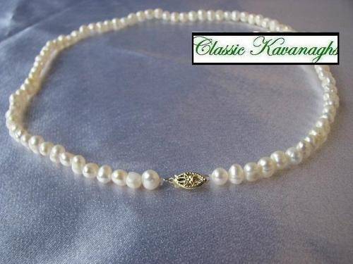 Solid 14K Gold clasp on a Exquisite White Fresh Water Pearl Necklace