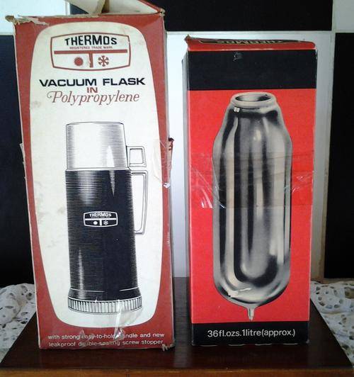 A Vintage thermos vacuum flask made in England with the exact thermos vacuum refill - a rare set