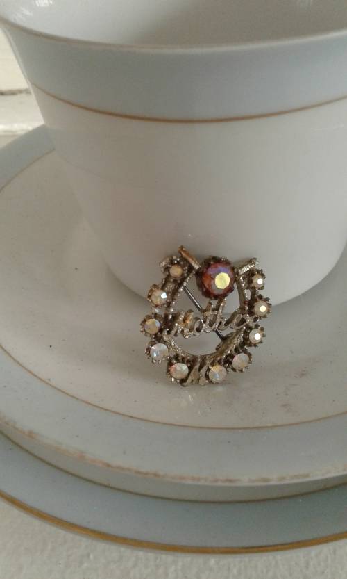 Antique Rhinestone Mother Brooch In Silver Toned Frame