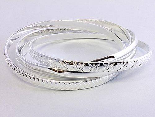 HIGHLY POLISHED AND PATTERNED STACKABLE BANGLES