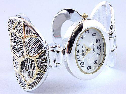 HIGHLY POLISHED - GENEVA PLATINUM CUFF WATCH WITH ROUND PATTERNED ARMBAND
