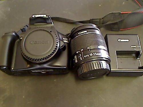 Canon EOS 1100 D Digital SLR Camera + 18x55  Lens + Cables + Charger + Lowepro Bag (Shipping R100)