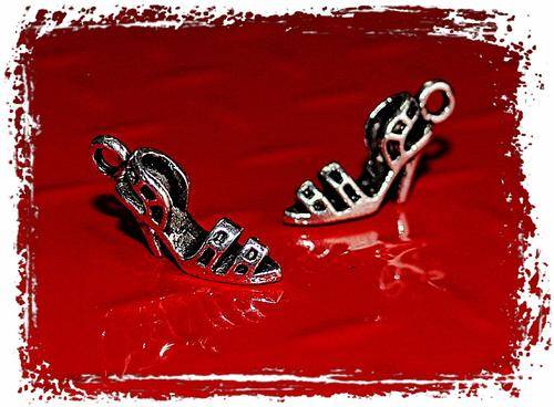 4 X SILVER HIGH HEELS