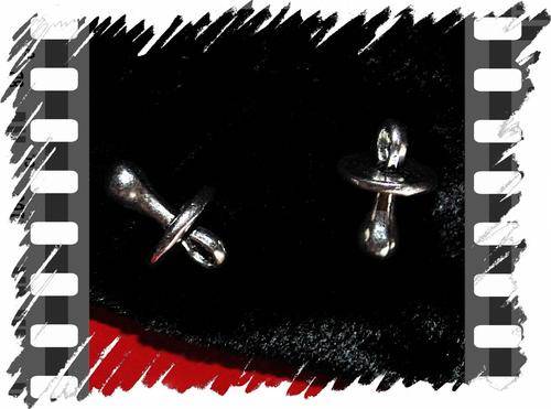 4 X SILVER DUMMY CHARMS