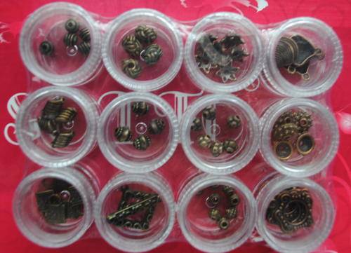 12 STORAGE CONTAINERS WITH FINDINGS