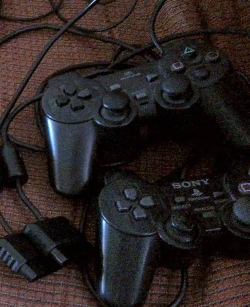 PlayStation 2 plus EXTRAS EXTRAS