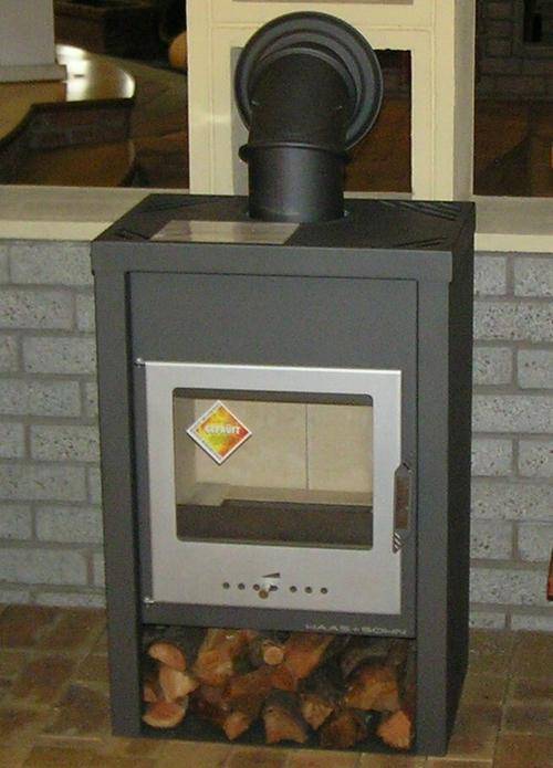 WOODSTOVE/FIREPLACE  WITH COMBUSTION; IMPORTED FROM GERMANY
