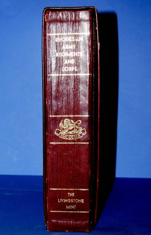 Leather bound Livingstone Mint book of Rhodesian Army Regiments and Corps.