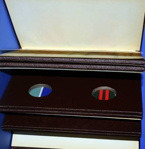 Leather bound Livingstone Mint book of Rhodesian Army Regiments and Corps.