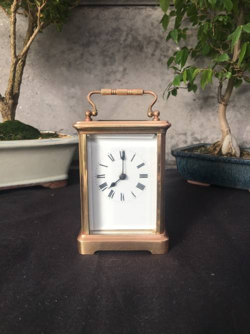 WOW !!!! CLASSIC BRASS FRENCH CARRIAGE CLOCK STAMPED "MADE IN FRANCE" WITH A PORCELAIN FACE