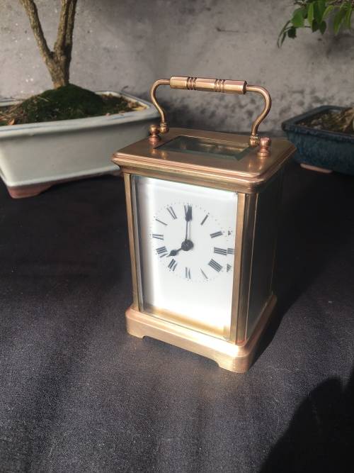WOW !!!! CLASSIC BRASS FRENCH CARRIAGE CLOCK STAMPED "MADE IN FRANCE" WITH A PORCELAIN FACE