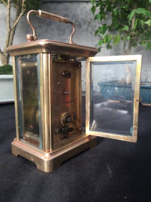 WOW !!!! CLASSIC BRASS FRENCH CARRIAGE CLOCK STAMPED "MADE IN FRANCE" WITH A PORCELAIN FACE