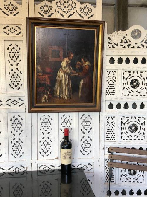 18th/19th CENTURY CONTINENTAL SCHOOL OIL PAINTING ON A WOOD PANEL - LADY WASHING HER HANDS - FRAMED