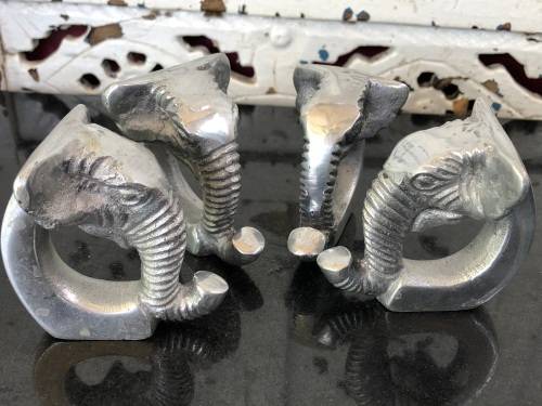 WOW !!! GORGEOUS SET OF FOUR CAST ALUMINIUM ELEPHANT SHAPED SERVIETTE RINGS