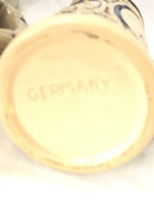 Set of 2 Graduating German Pottery Beer Steins Complete with pewter Lids.